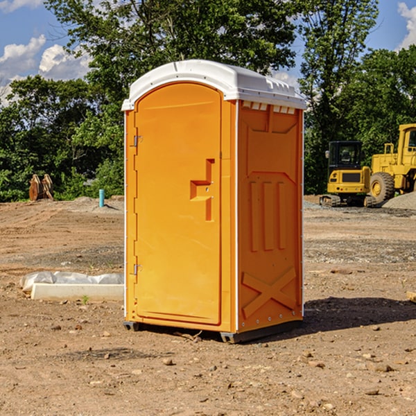 how often are the portable restrooms cleaned and serviced during a rental period in Paul